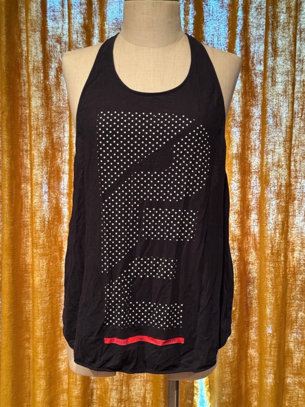 P.E Nation Black Racerback Tank with White Dot Logo and Red Trim